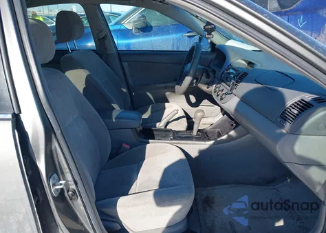 2002 Toyota Camry Le from USA, damaged, VIN 4T1BE32K32U628037